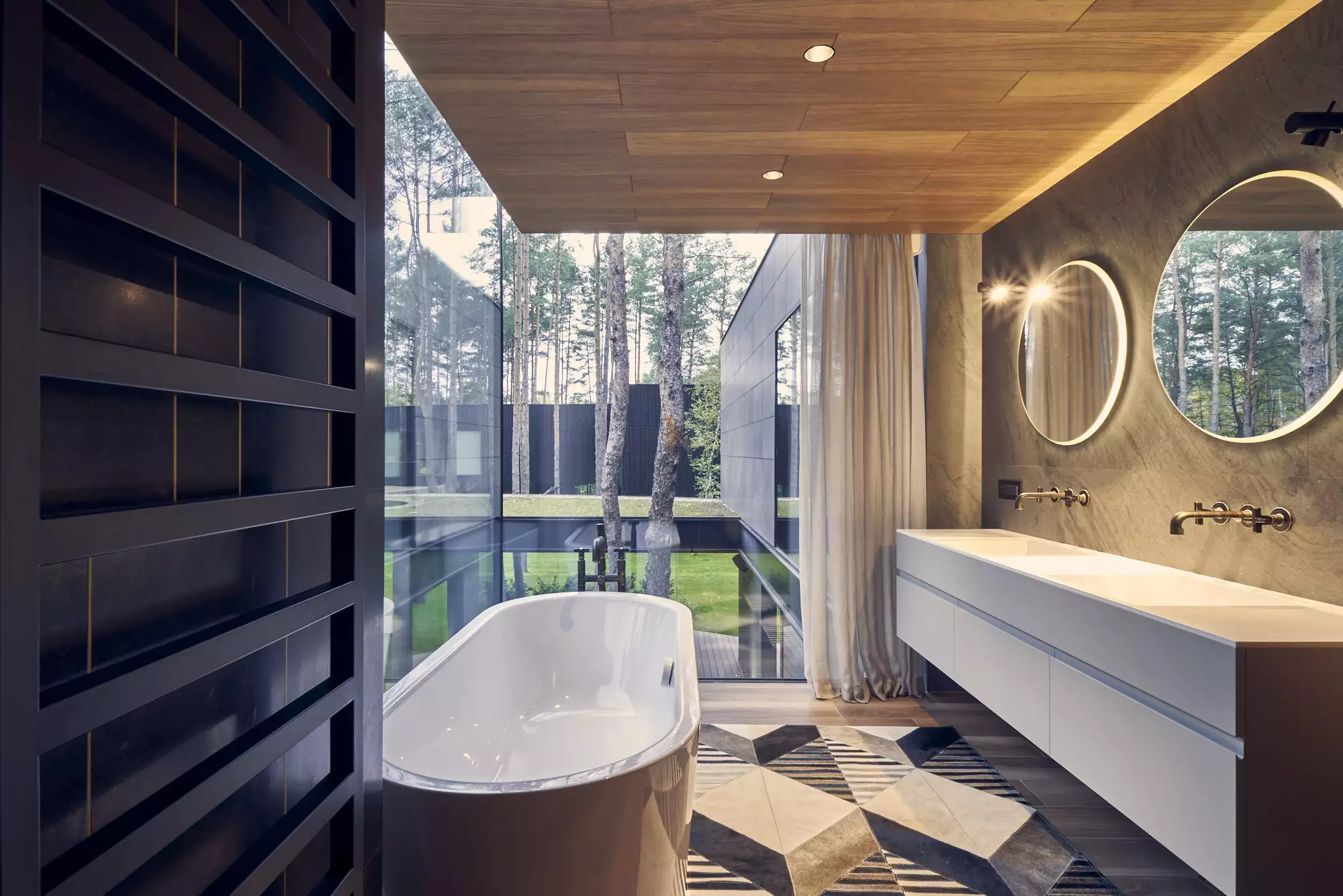 Circle Wood's upstairs includes private areas like bedrooms and bathrooms, which overlook the central garden atrium