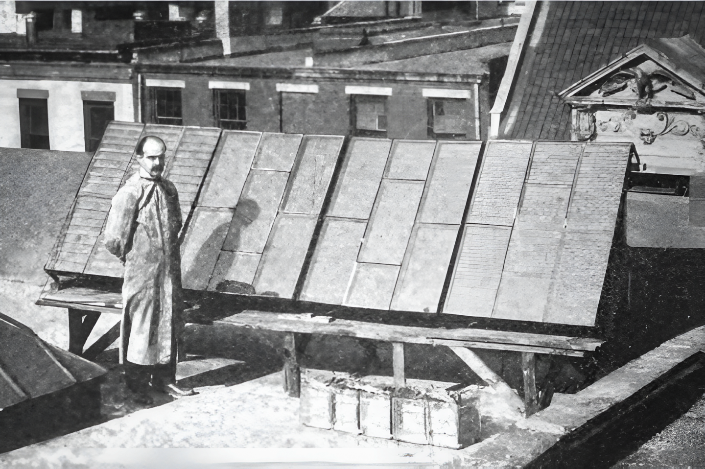 George Cove stands with his third solar array. From