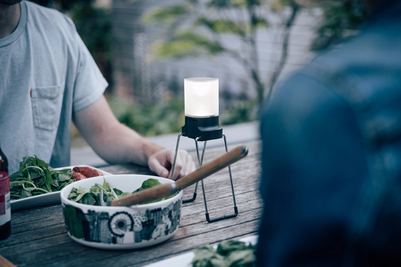 The versatile lantern can stand or hang up with its multi-purpose leg-handles