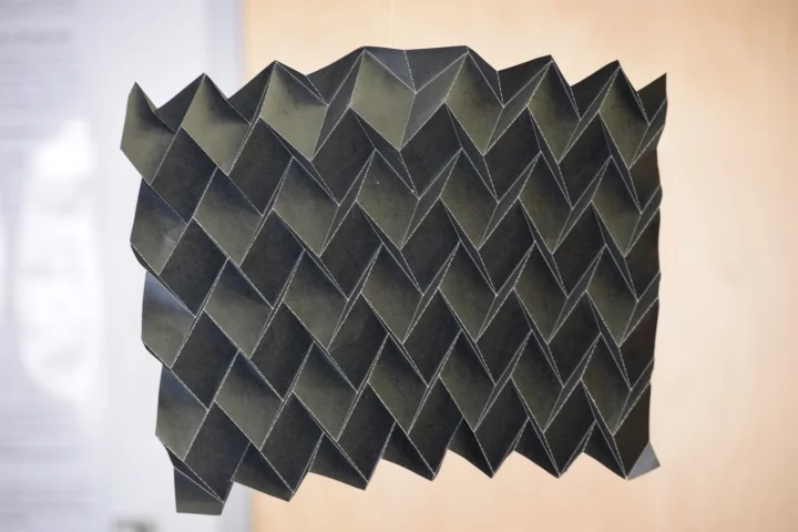 The folding radiator could replace existing flat, heavy satellite radiators