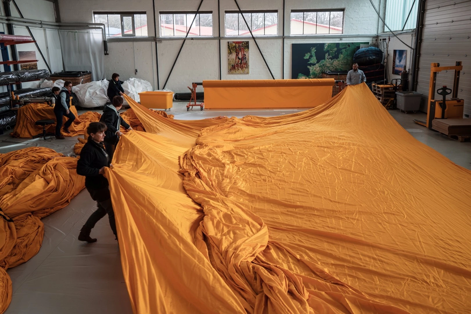 75,000 square meters of yellow fabric are sewn into panels
