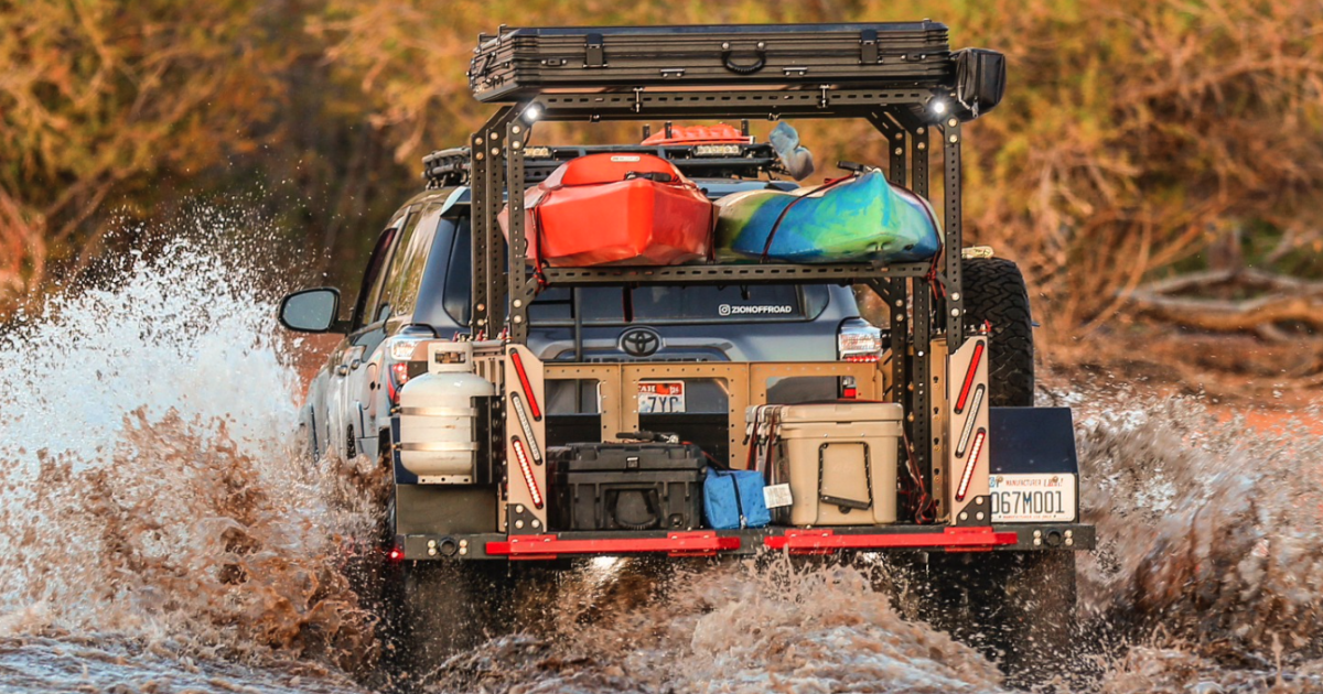 Skeletal off-road cargo trailer mods into gear-stacking micro-camper Skeletal off-road cargo trailer mods into gear-stacking micro-camper