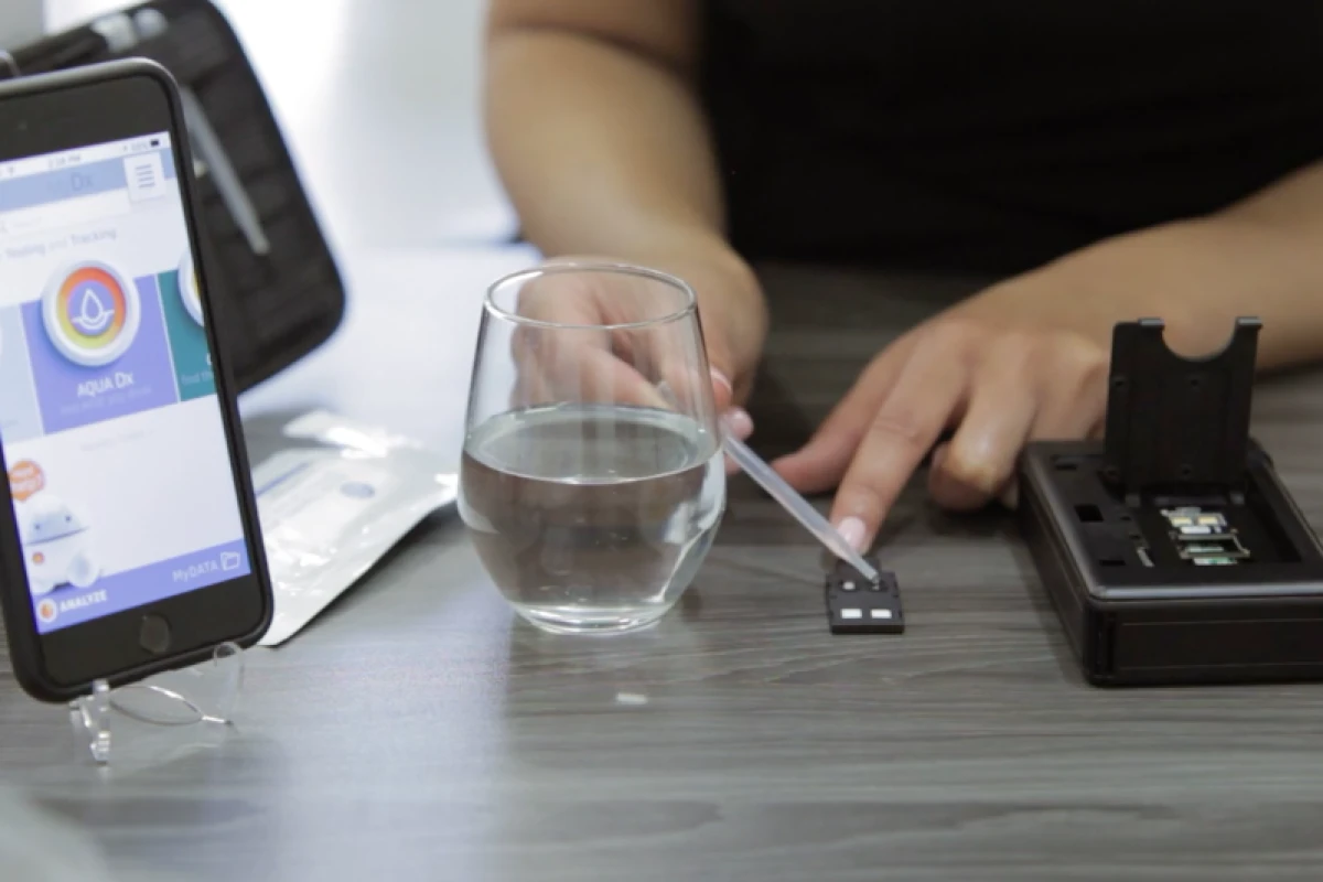 Testing a water sample with AquaDx