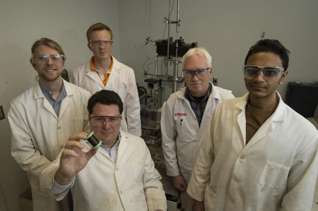 Rice engineering professor Matteo Pasquali (seated) with (from left) Rice graduate students Colin Young and Dmitri Tsentalovich, Teijin Aramid scientist Ron ter Waarbeek and Rice graduate student Mohammed Adnan