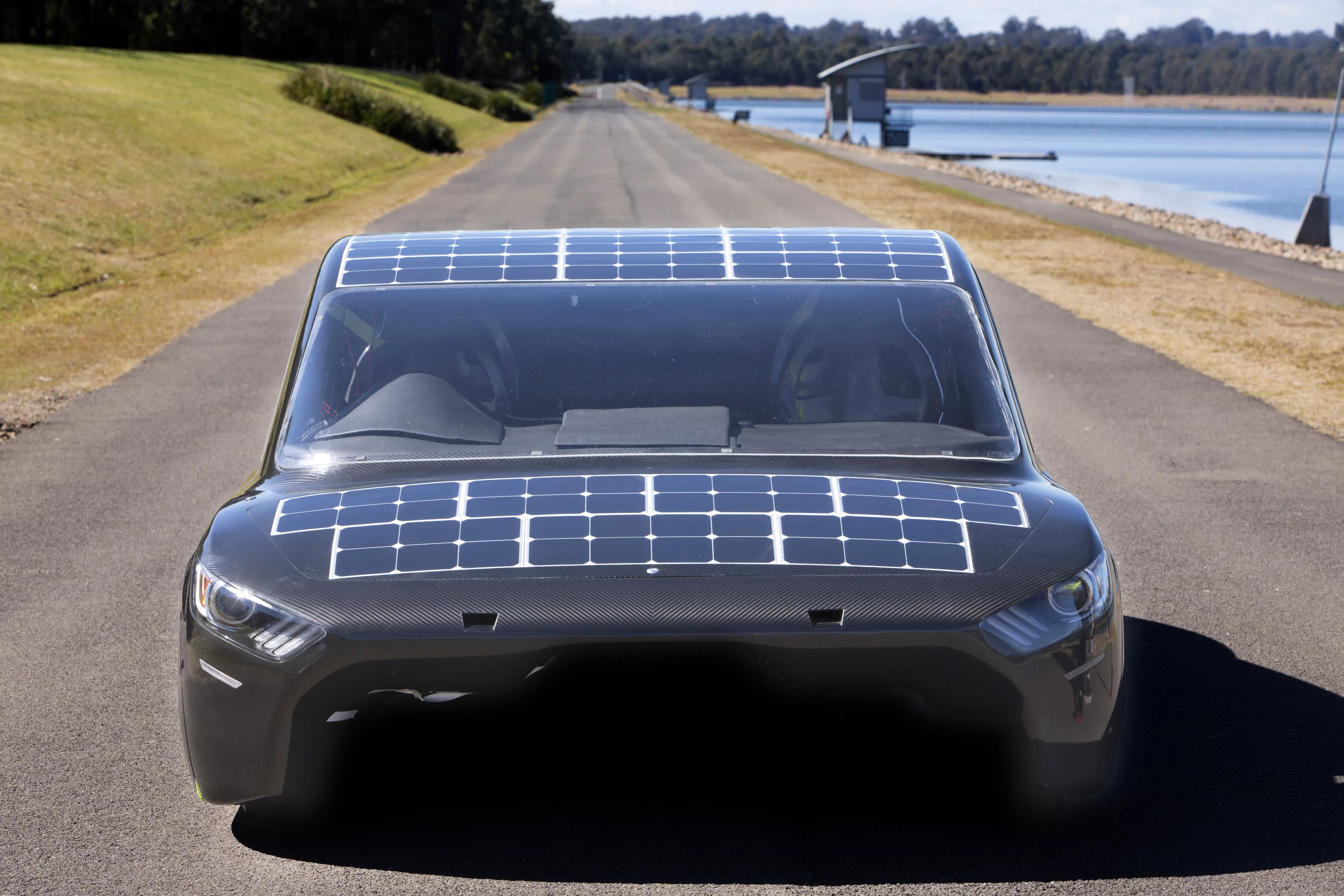 Upper surfaces of the Sunswift Violet electric sedan are covered in 284 microcrystalline solar cells