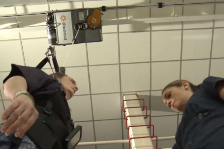 The Vector Gait and Safety System uses a track-mounted robotic trolley to keep patients from falling down