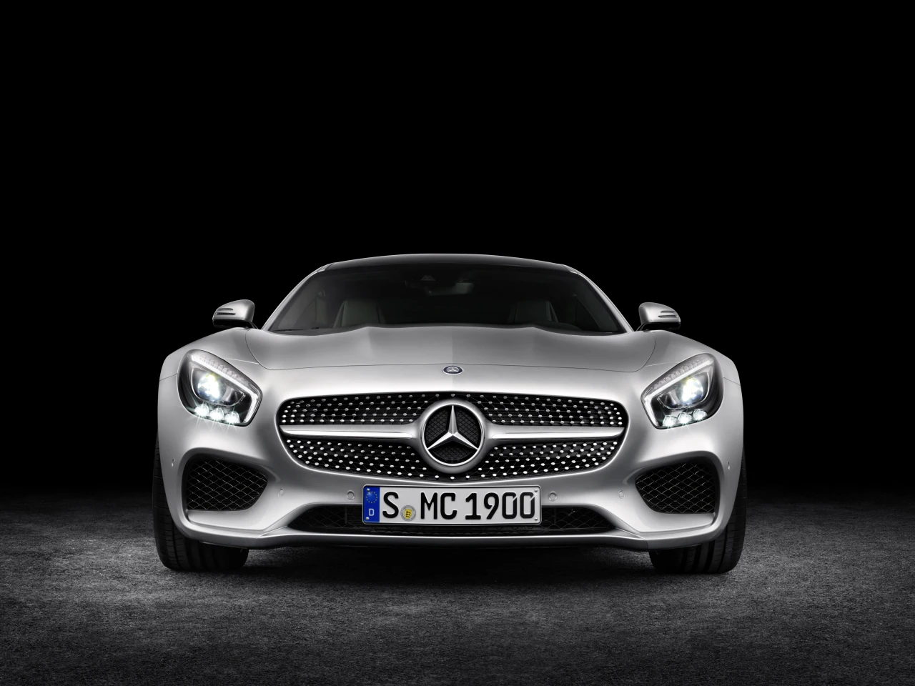 Up front, the car's wide air intakes grant it a great presence on the road