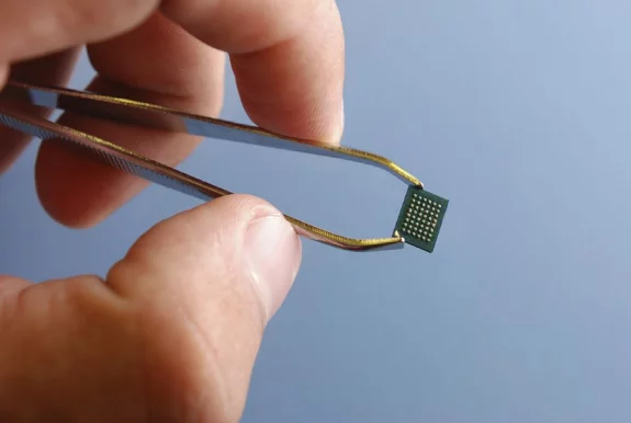 The paper used is about as thick as card stock, and the embedded chip can hold 8-32 MB of data