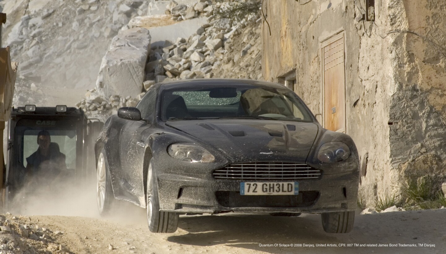 This 2008 Aston Martin V12 DBS is one of seven used by Bond (Daniel Craig) in "Quantum of Solace". The all-alloy 5935 cc V12 engine has a prodigious power output thanks to a state-of-the-art engine with high compression, quad cams and four-valves-per-cylinder (for a total of 48). The car was sold for GBP£241,250 (US$390,696) at a Christie's auction in London in October, 2012