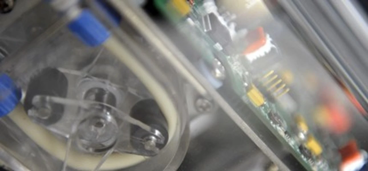 The robotic arm is equipped with sensors to determine milk quality