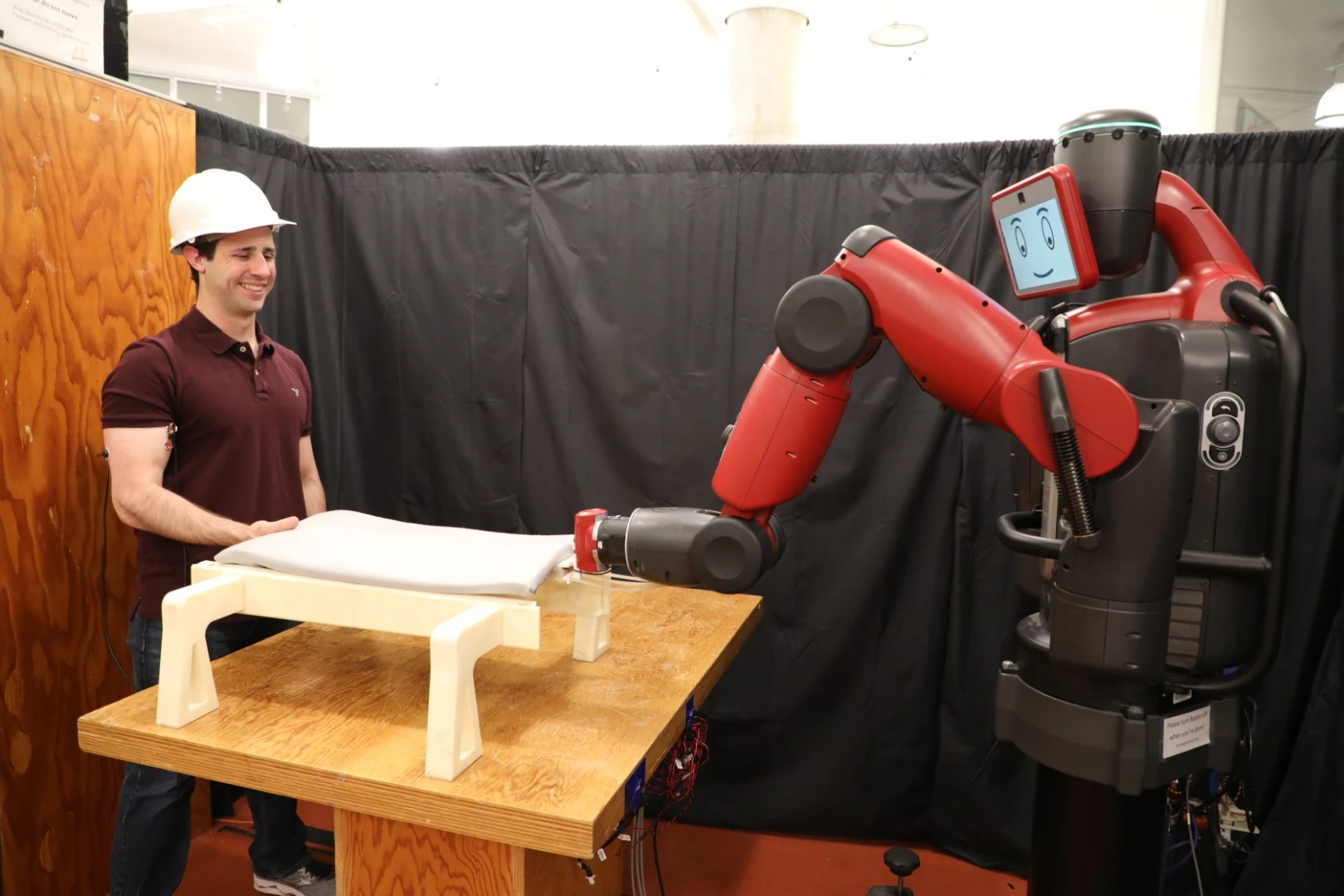 The team tested out RoboRaise by picking up and assembling pretend aircraft components, along with rigid and flexible objects