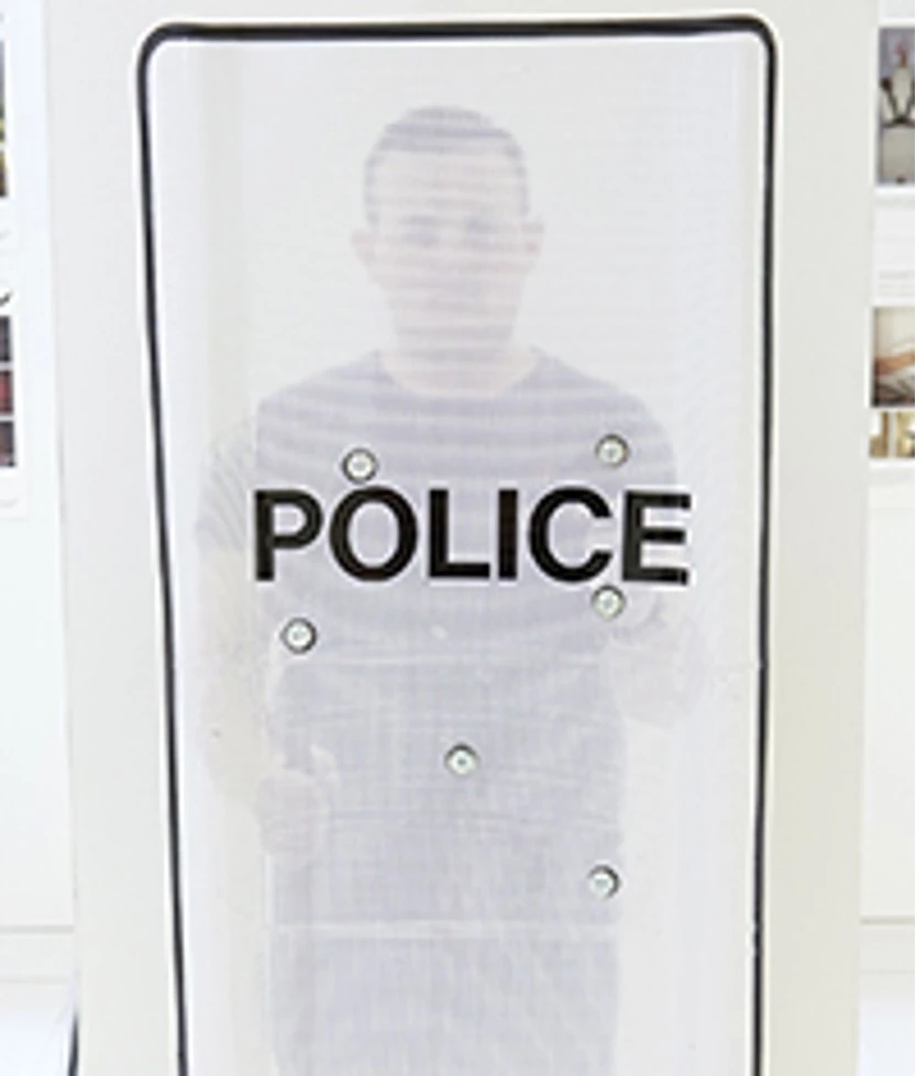 Ben Palmer behind his shield