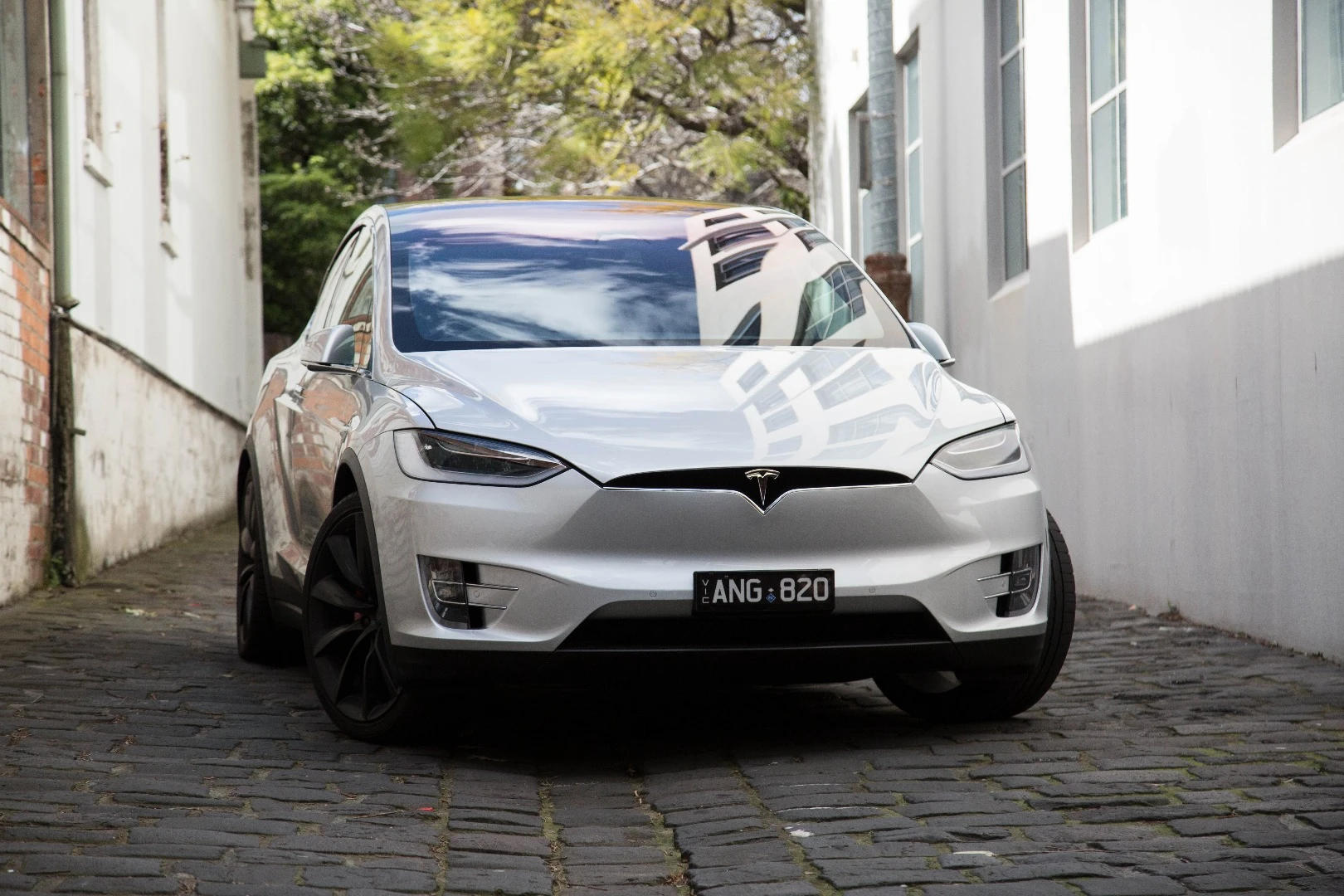 Without an engine to cool, the Model X can do without a front grille