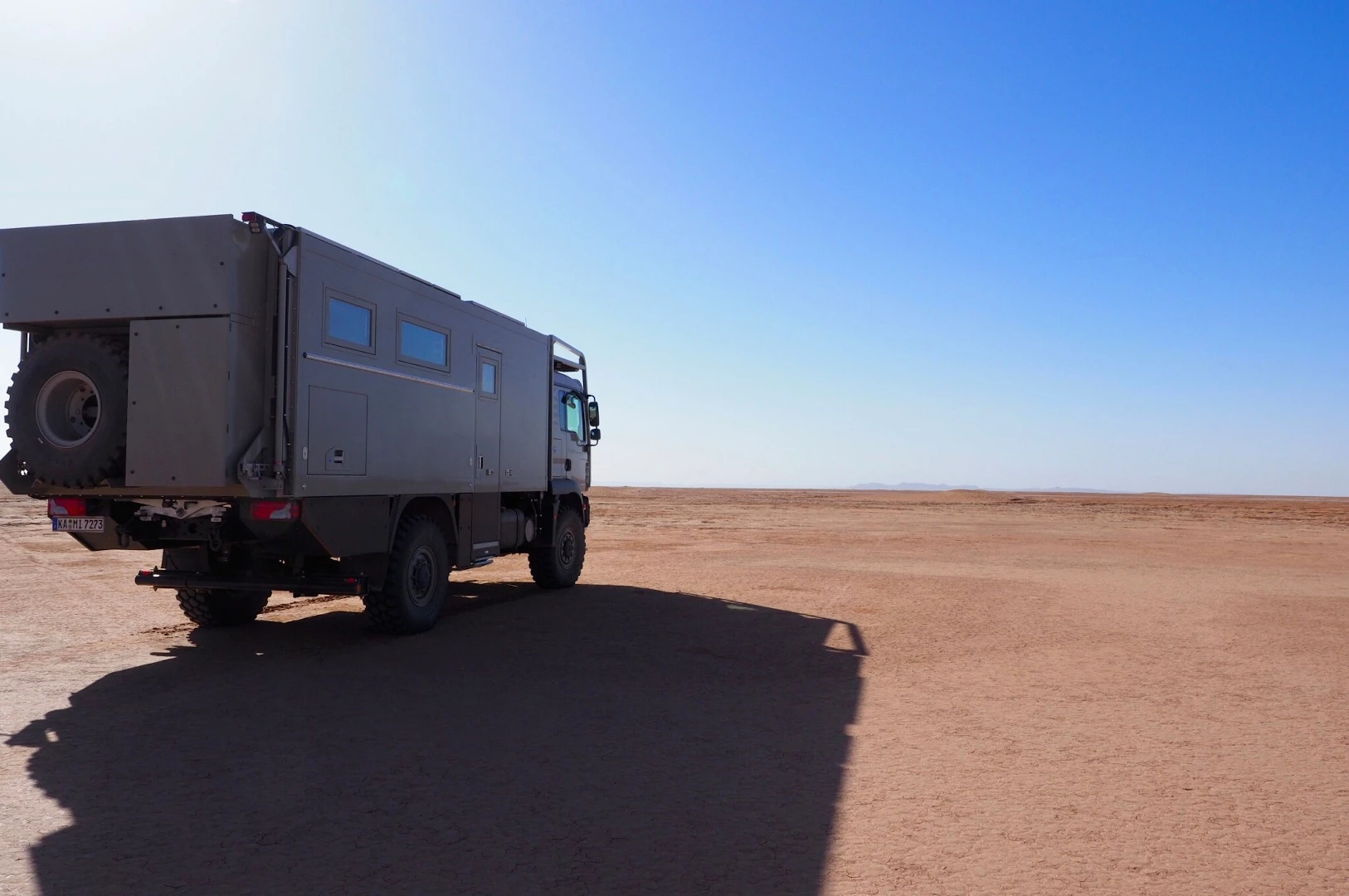 There's no motorcycle lift on back, as seen on the larger MD77h and other expedition vehicles, but the MD57 does have a hydraulic load platform with spare tire and dual storage boxes
