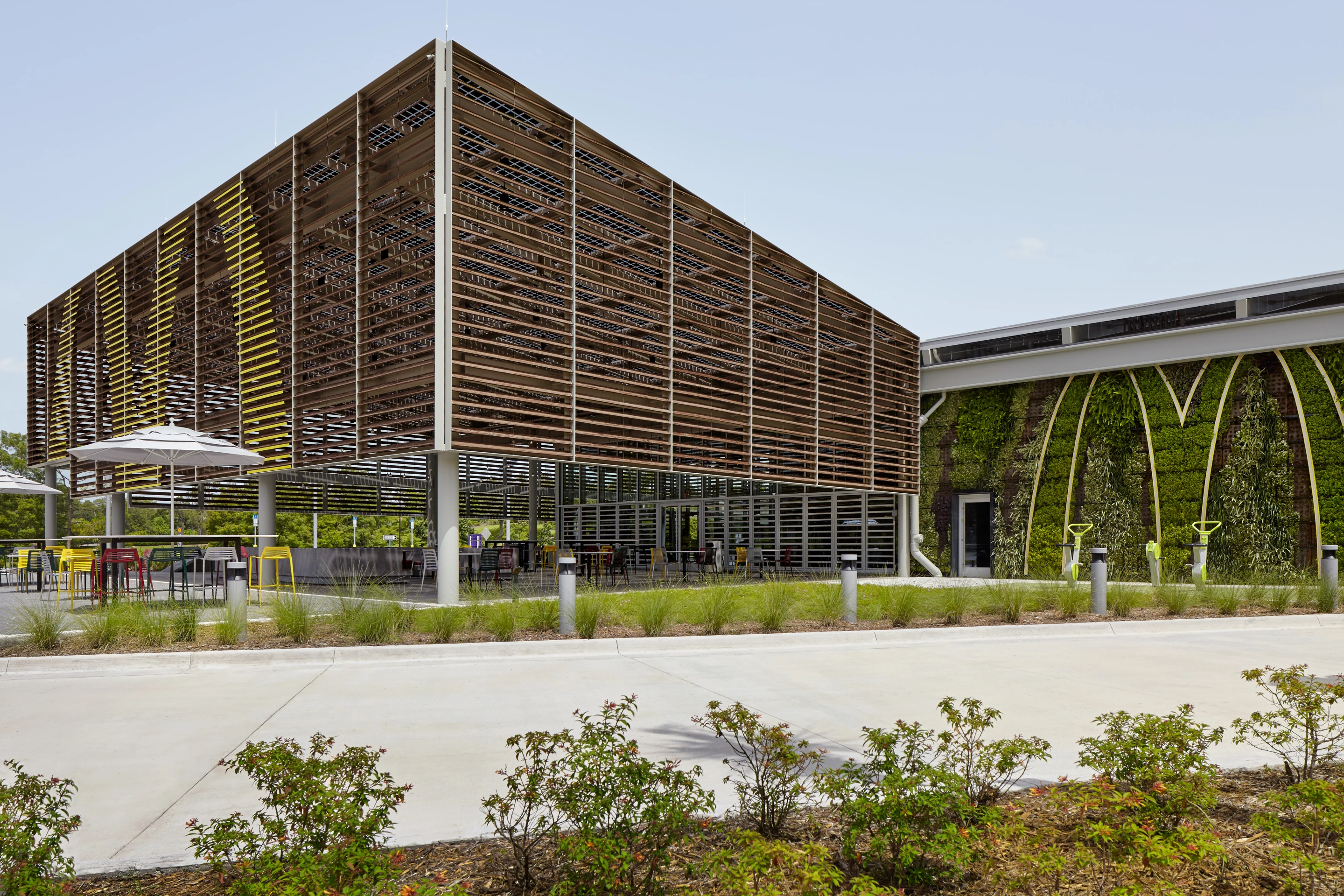 Visitors to McDonald's Disney World can ride stationary bikes to make lighting in a green wall area illuminate