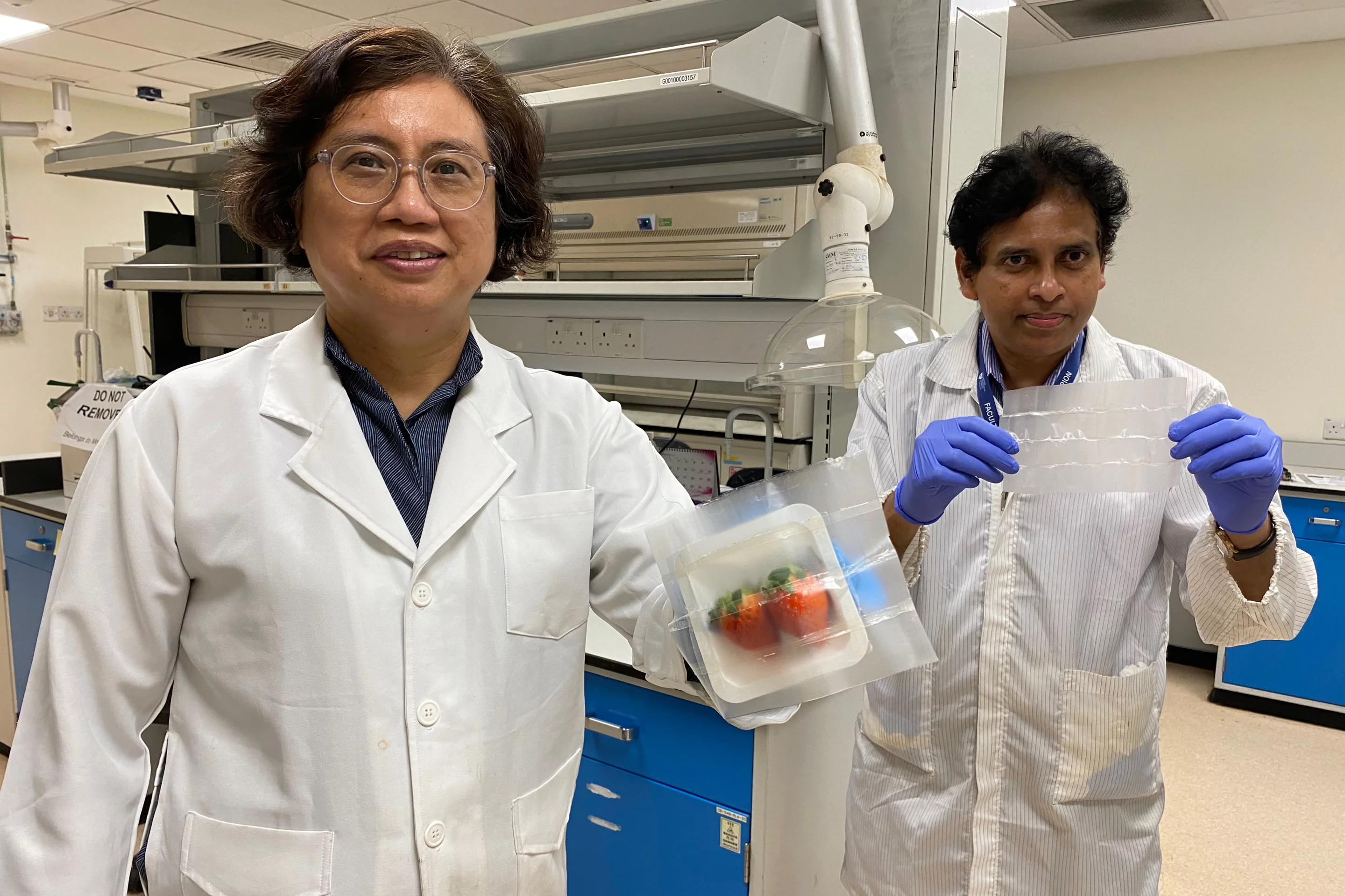Prof. Mary Chan (left) and Dr. Suresh Kumar Raman Pillai, with samples of the antibacterial film
