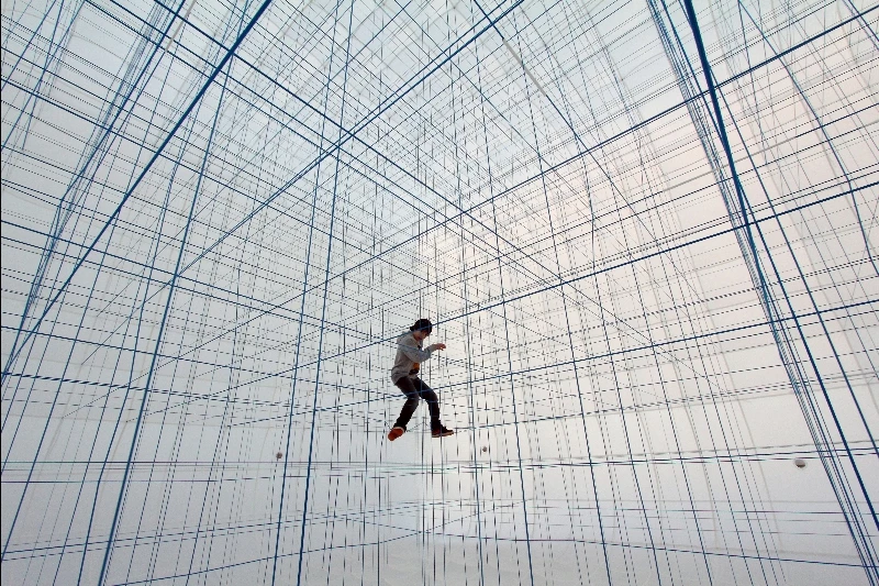 String is a large, inflatable cube filled with a grid of ropes