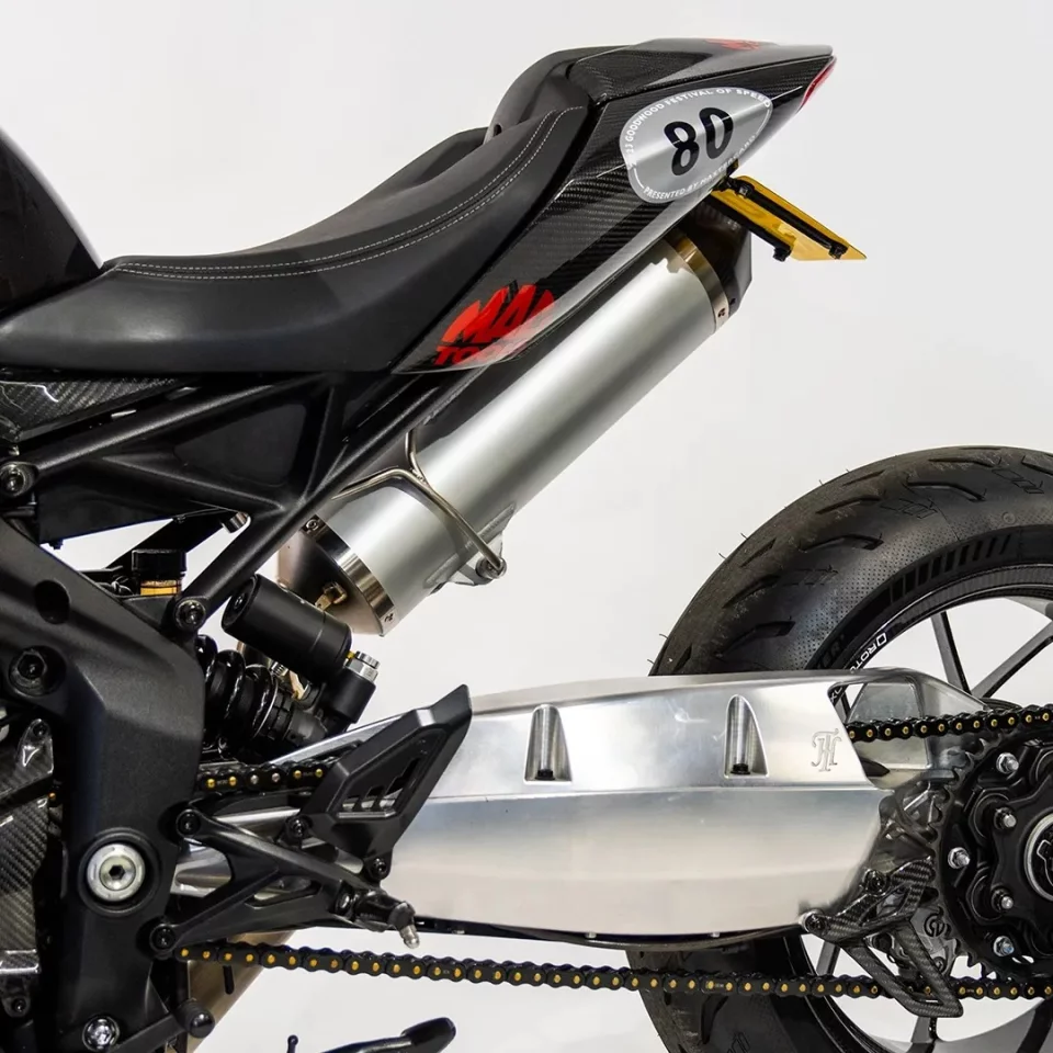 The charger is fed methanol from the billet aluminum swingarm in this setup