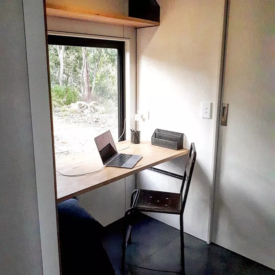 The Sowelo tiny house features a cozy nook area, ideal as a quiet reading area or study