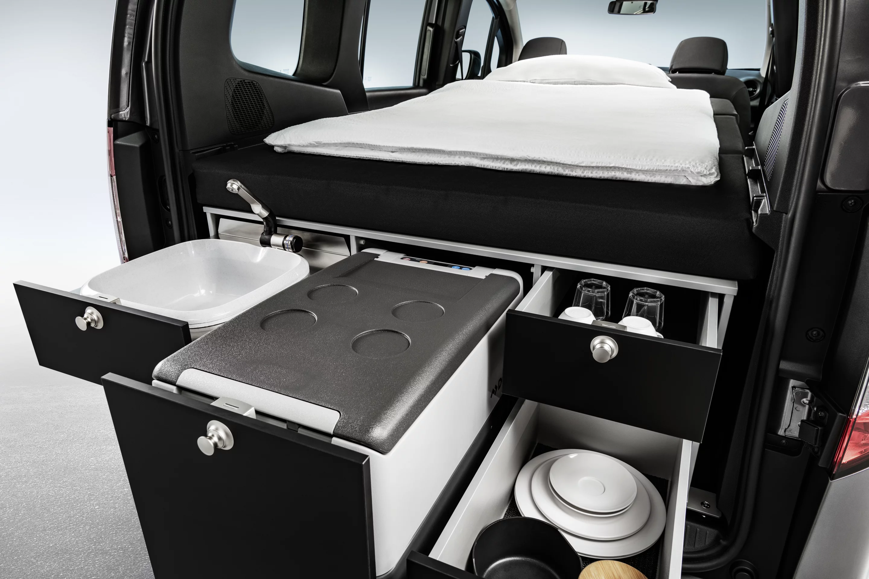 The various drawers and slide-outs of the VanEssa kitchen module