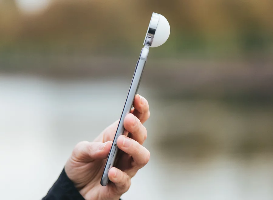 The domed Lumu Power dongle is also capable of measuring color temperature, white balance and flash