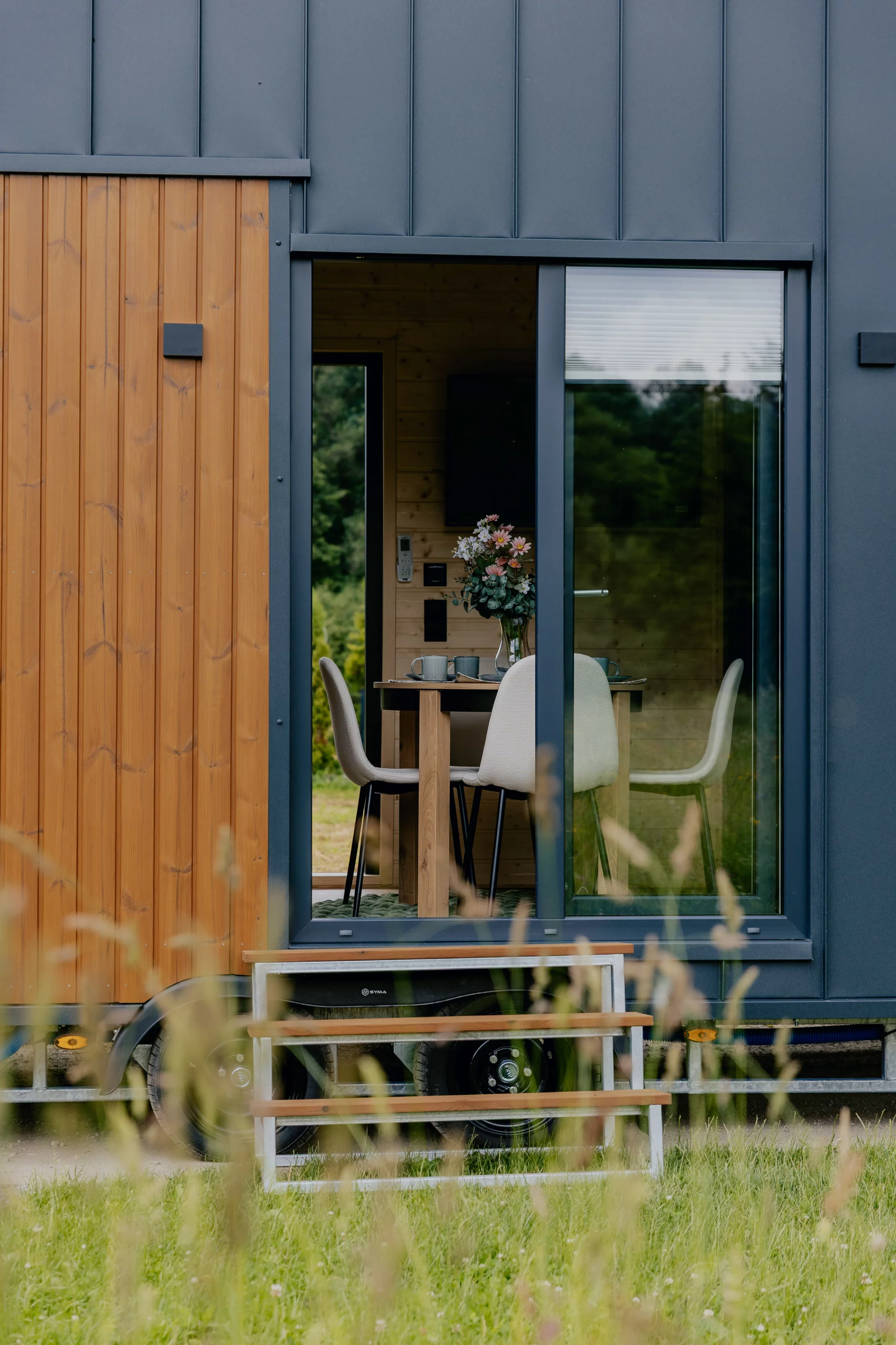 The Alan opens up to the outdoors with two separate glass door entrances