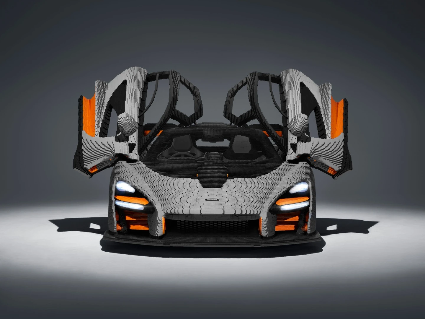 The model includes McLaren's famous dihedral doors