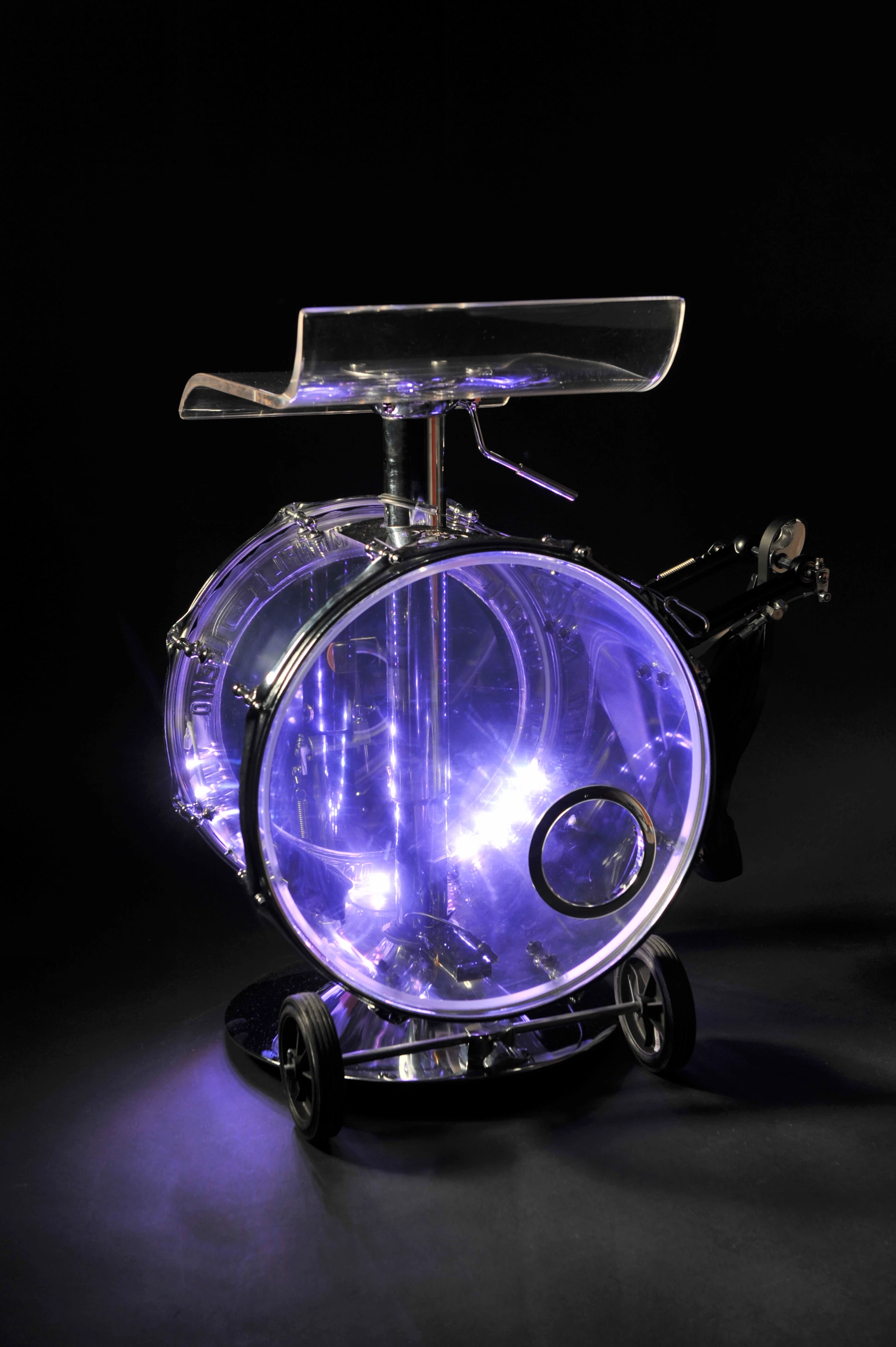 The acrylic Drumstooled has a battery-operated RGB LED lighting system built in to add a bit more magic to the performance