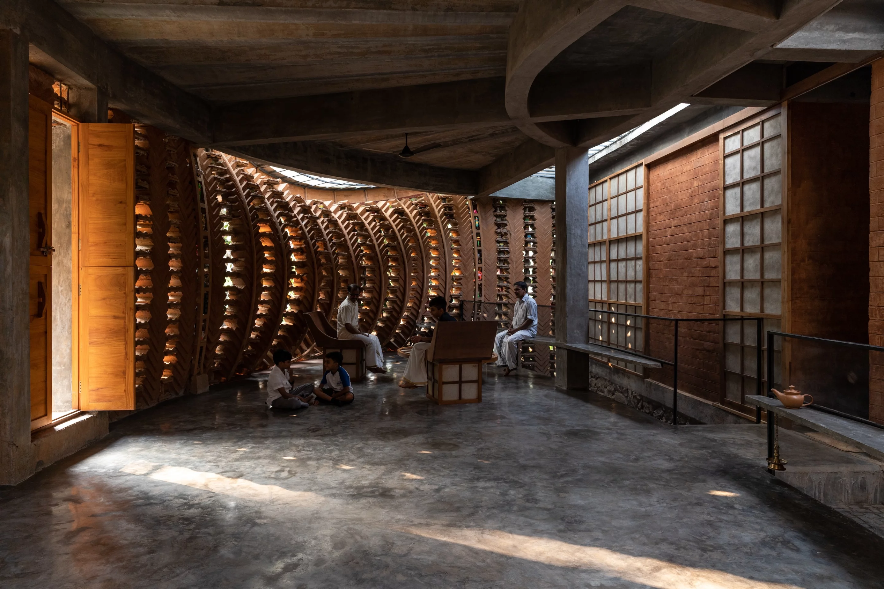 Toy Storey's interior includes a narrow courtyard area, helping maximize ventilation