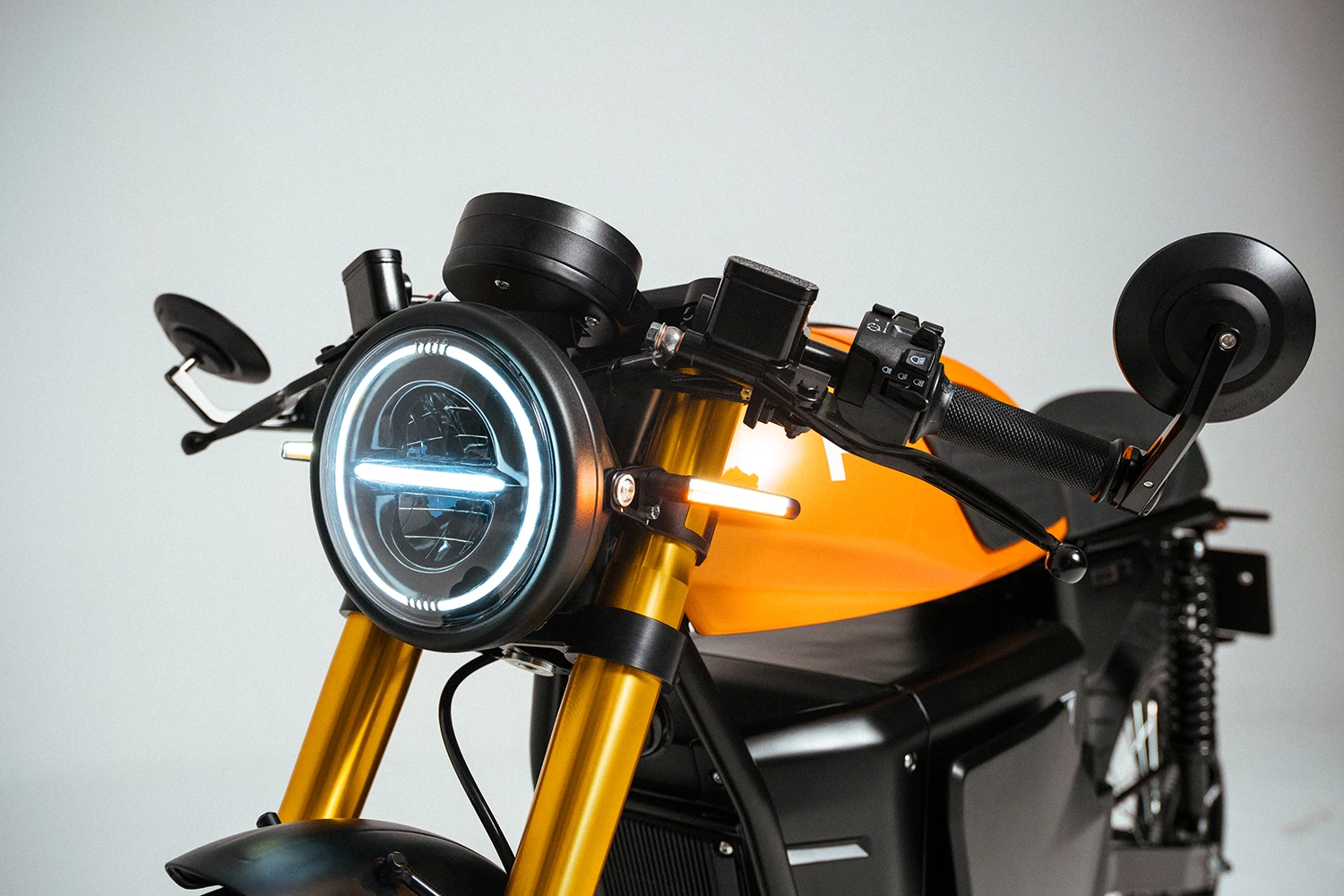 The E-XF comes powered by a 72 -V/40- Ah pack and a 5.5-kW rear-hub-mounted motor that offers a range of up to 75 miles (120 km)