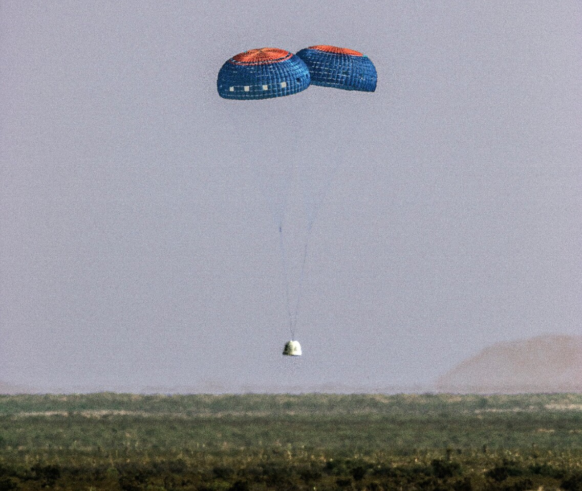 The crew capsule floated gently back to Earth, but with only two of its parachutes deployed rather than three