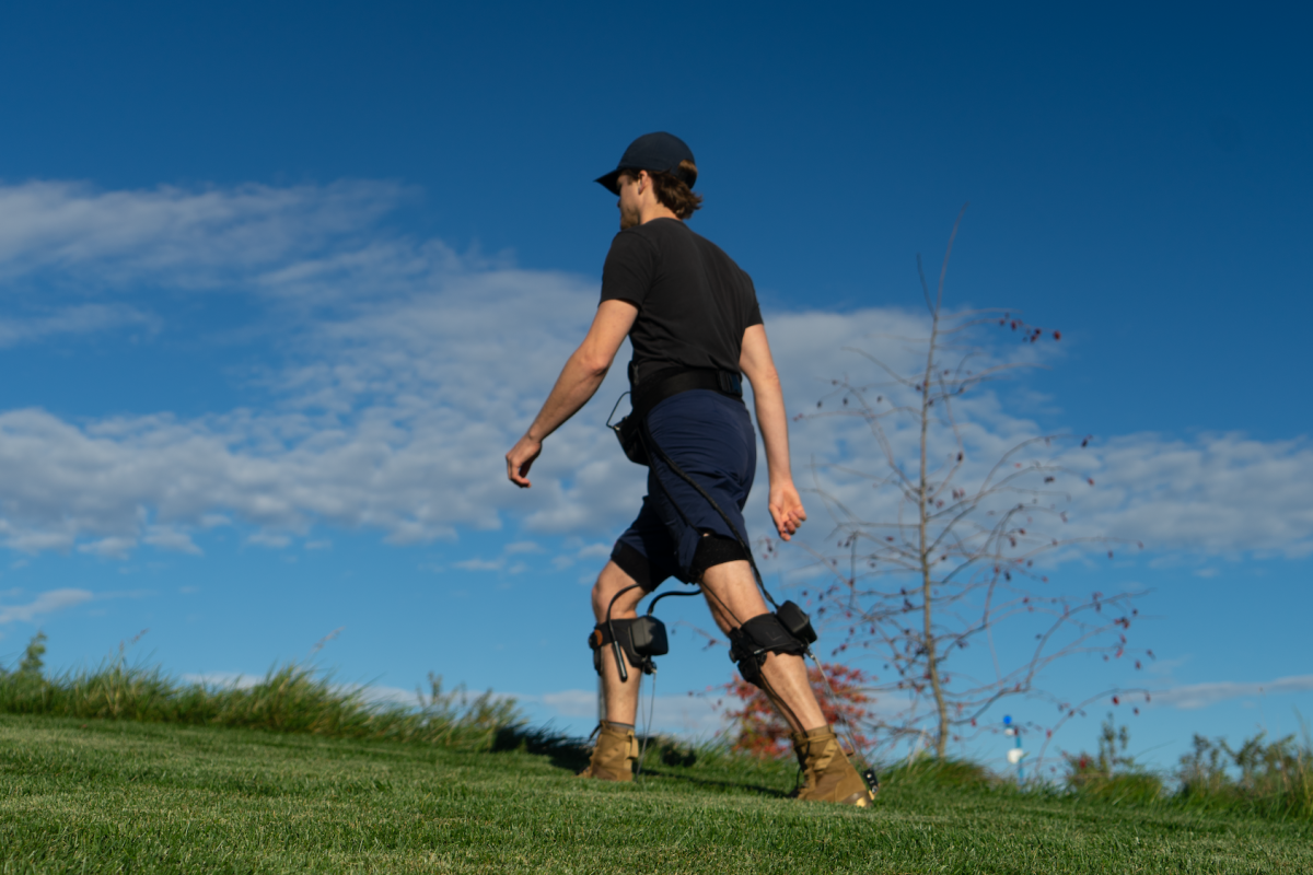A volunteer uses an exoskeleton which was calibrated to his gait using ultrasound recordings of his calf muscles