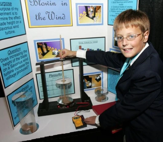 Discovery Channel Young Scientist Challenge Finalist, Jacob Perry, 11, of Livingston, Montana, displays how wind can be used to create energy at the National Academy of Sciences in Washington, DC on October 16, 2005. (Paul Morigi)