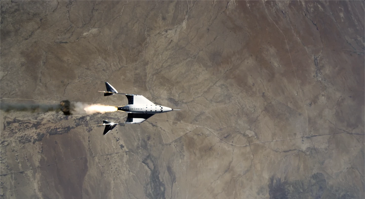 The VSS Unity ignites its rockets after separating from the VMS Eve mothership