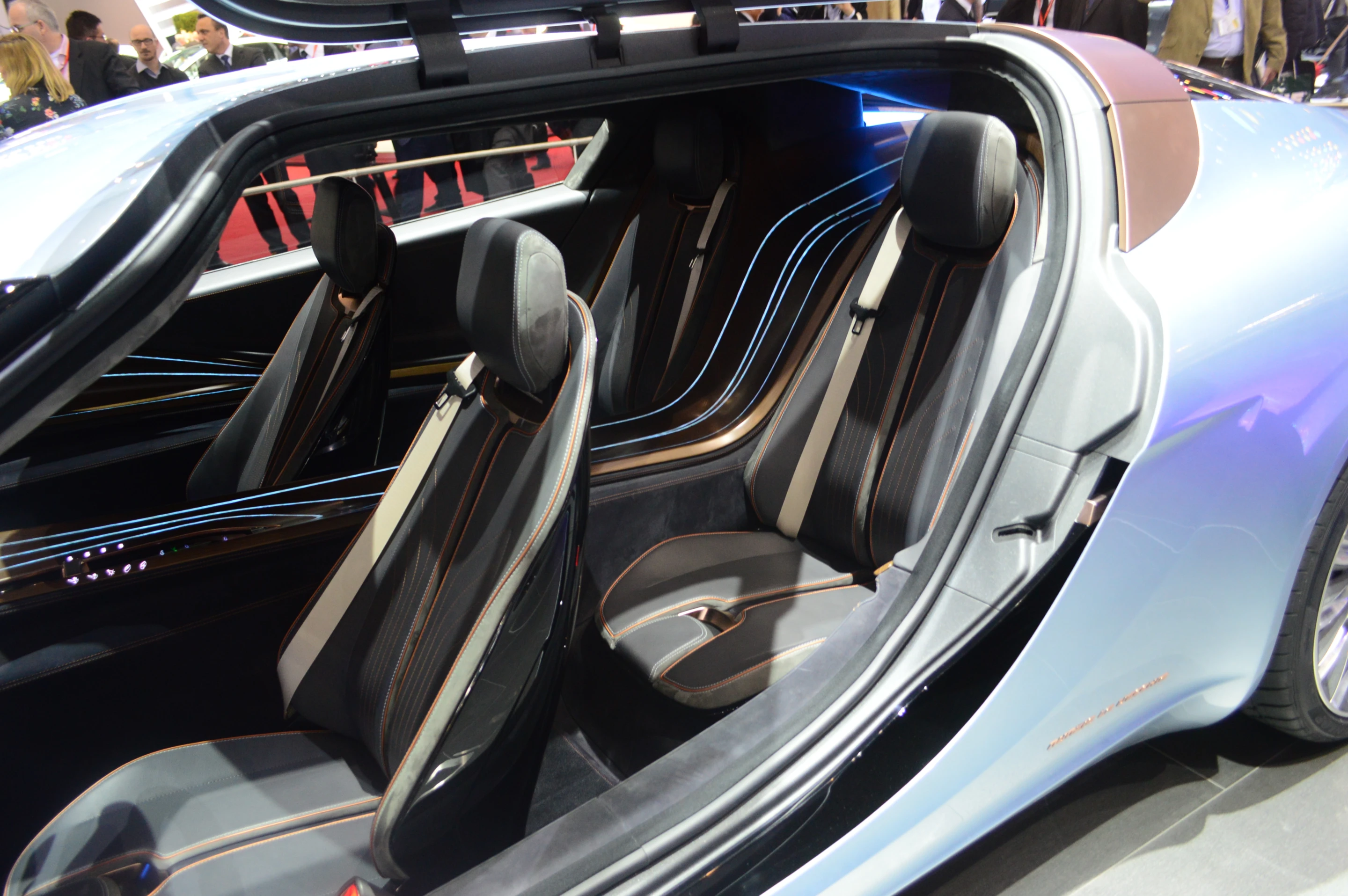 Leather, wood and LED lighting create a unique interior
