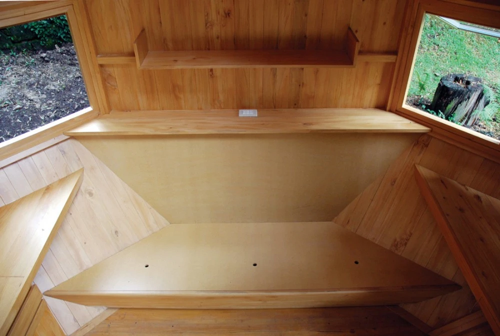 The Habitable Polyhedron features wooden furnishings