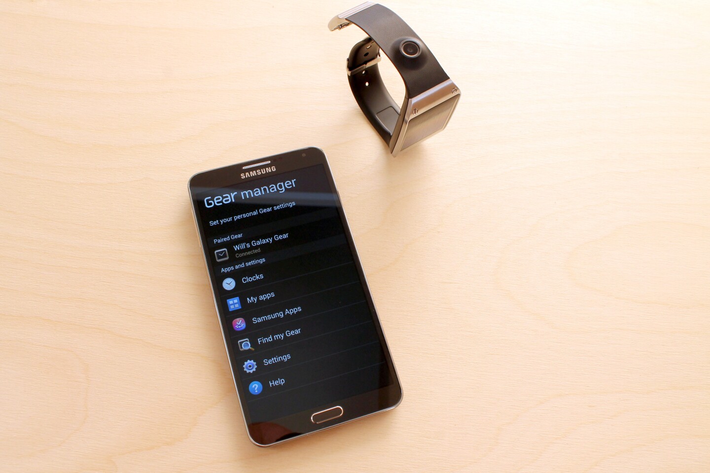 You can use Gear Manager to reorder the app icons in the watch's UI