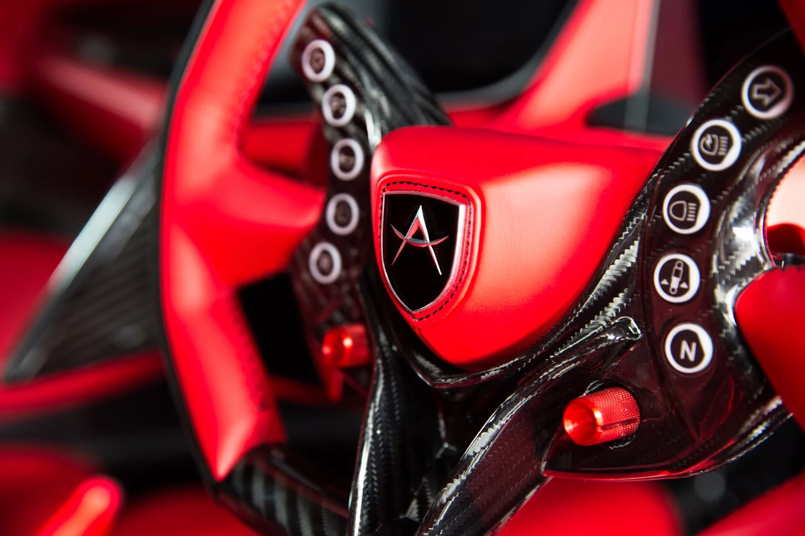 Apollo Intensa Emozione: lurid red steering wheel with buttons galore