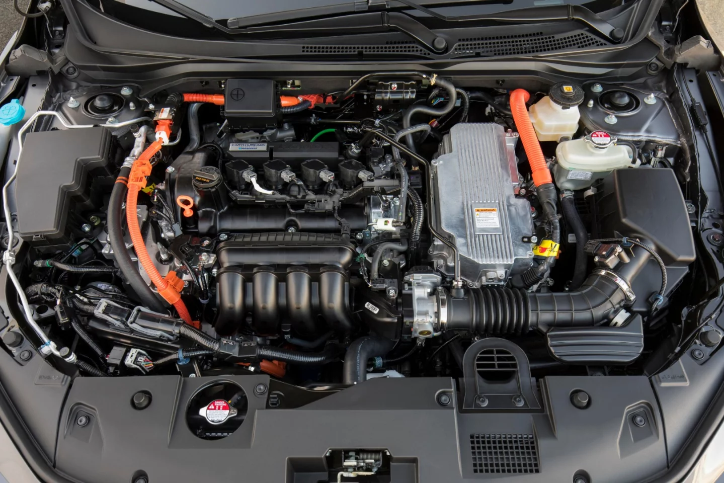The 2019 Honda Insight's powertrain is EV-centric, using the combustion engine more often as a generator to allow the electrics to do most of the work