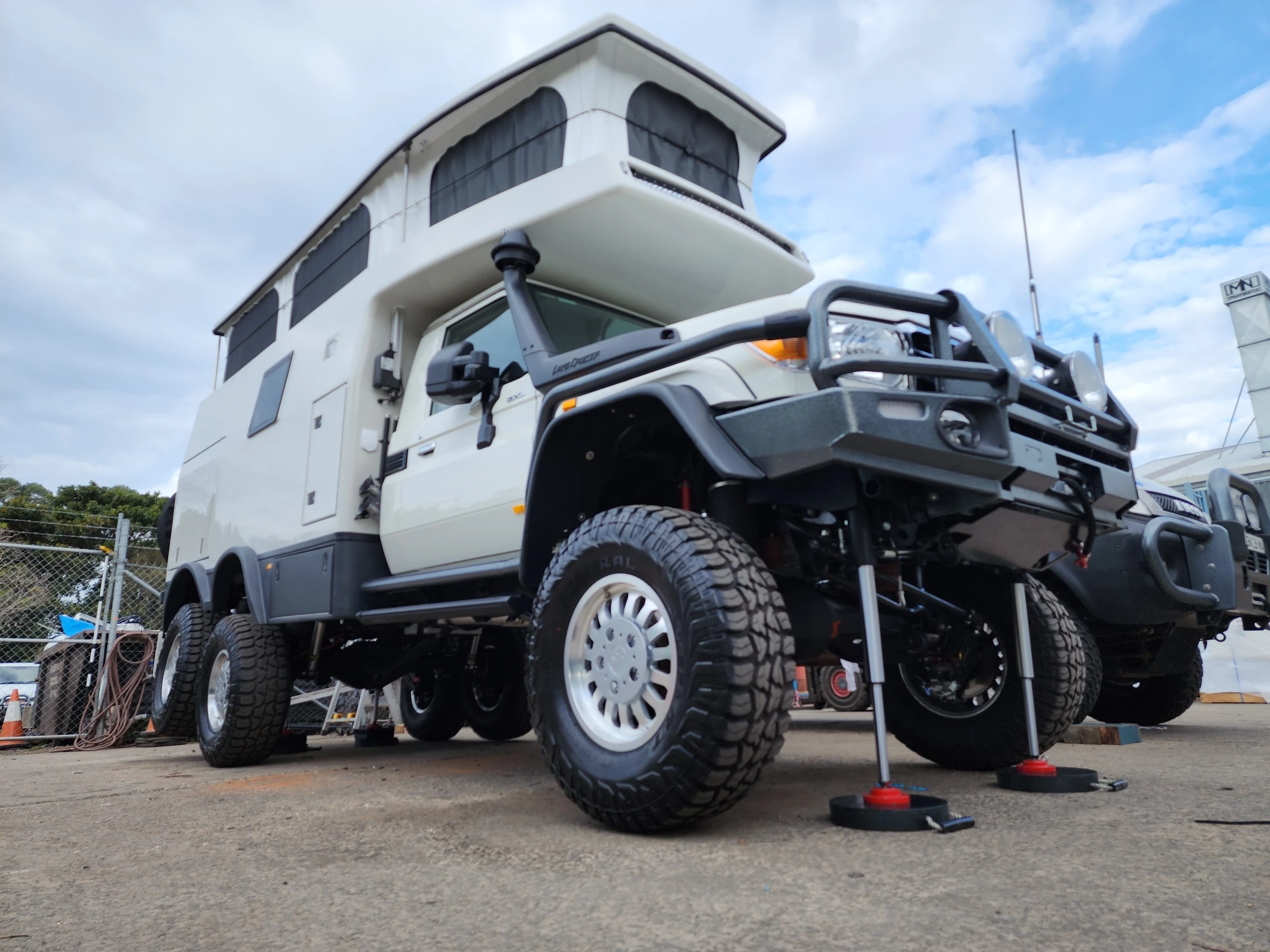 The XTR6x6 rides on 17-in EarthCruiser forged alloy wheels shod in 35-in Federal Xplora mud-terrain tires