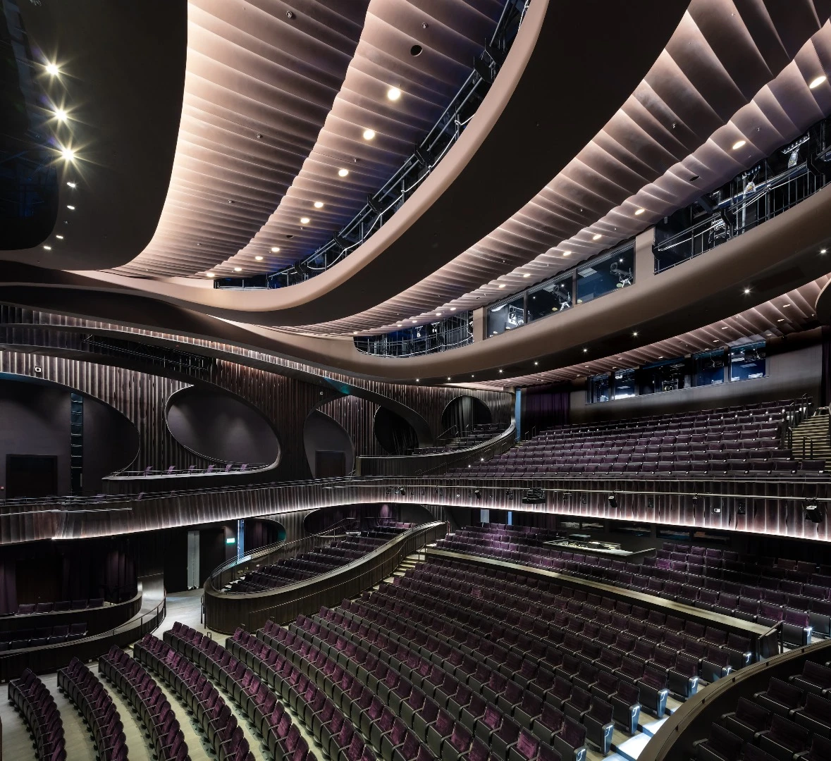 The suspended design of the Xiqu Centre protects the space against vibrations and noise from the city