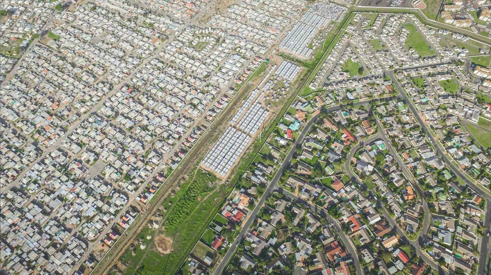 The Nomzamo/Lwandle township east of Cape Town was originally designed to house single male workers during the apartheid years. It has since grown into a suburb of more than 60,000