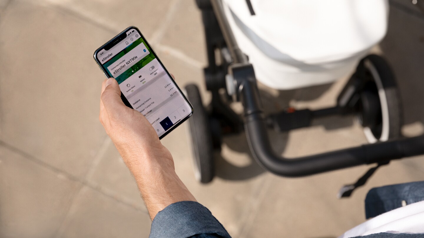 A companion app allows parents to dive into power settings, system status and set the e-stroller's alarm