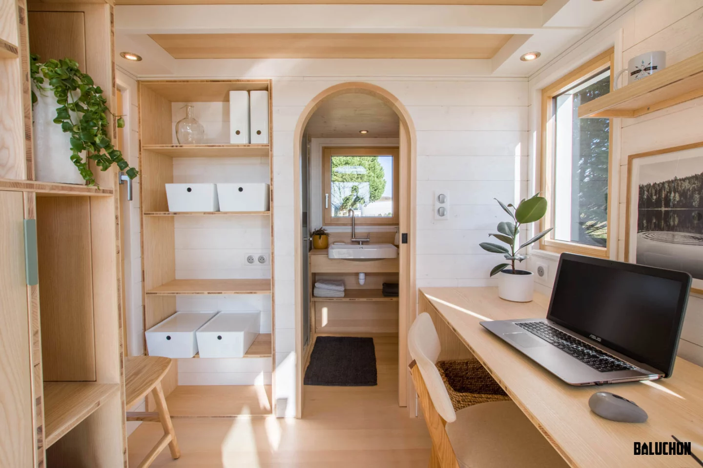 The Bois Perdus' kitchen area is currently taken up by a large home office