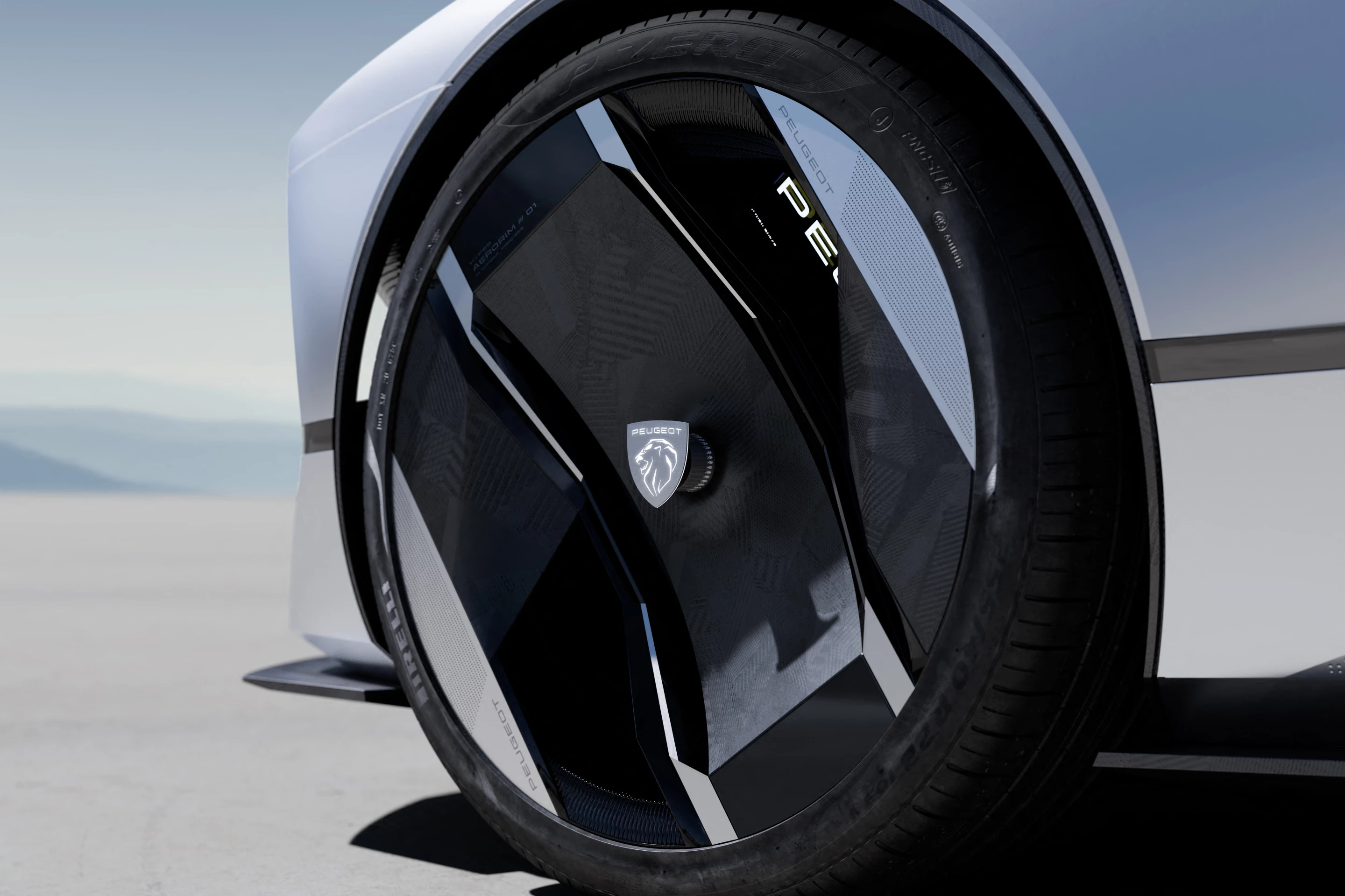 The Peugeot Inception concept rides on Aerorim wheels with a stationary illuminated Peugeot lion at the center