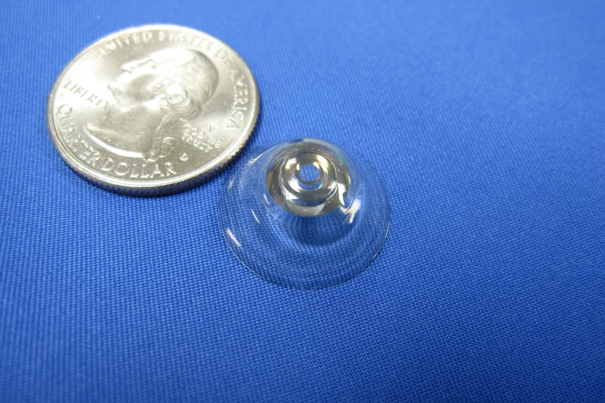 Prototype telescopic contact lenses may one day help sufferers of age-related macular degeneration (Photo: Eric Tremblay and Joe Ford/ EPFL)