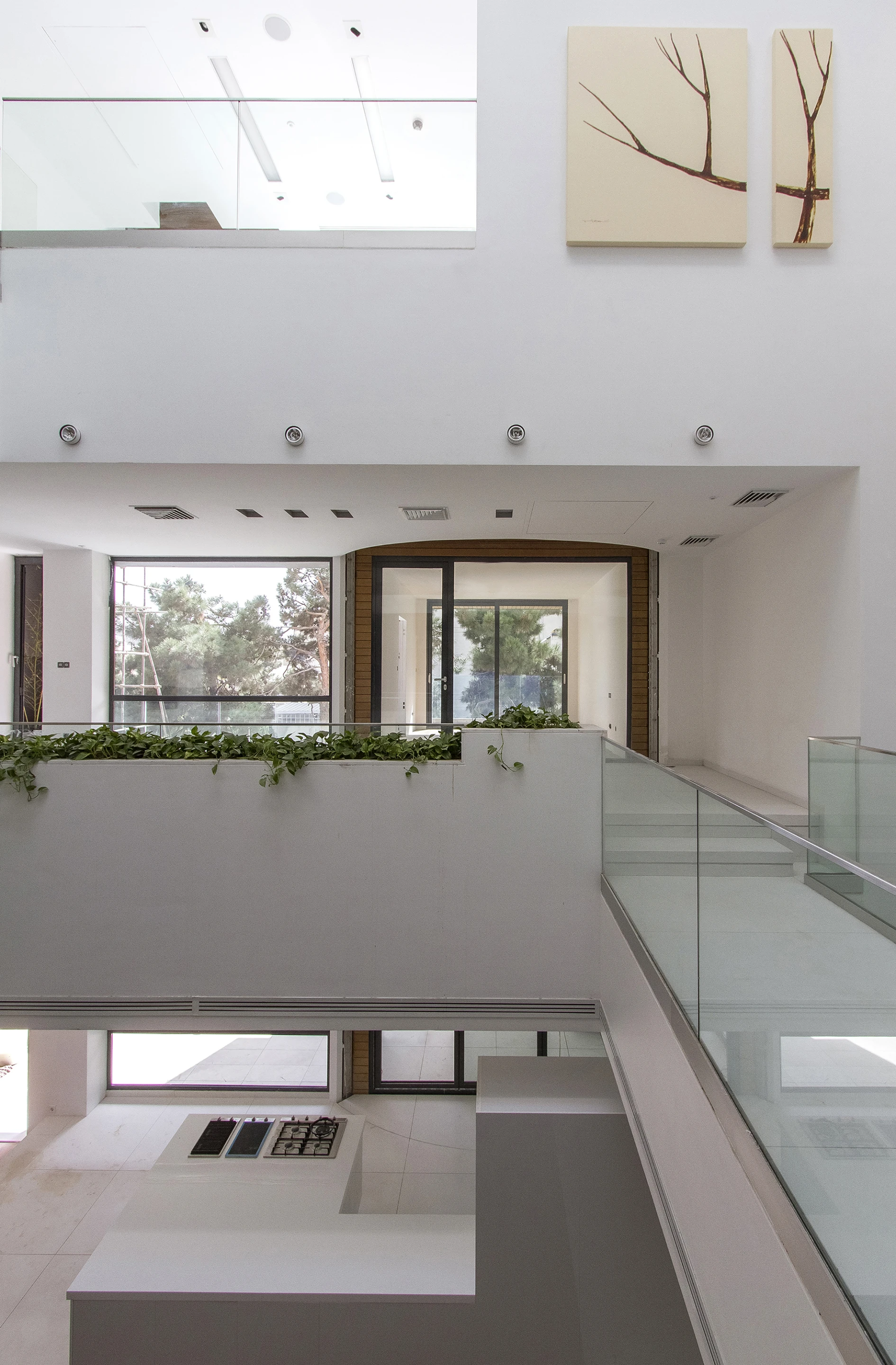 Upper levels are reserved for private areas like bedrooms, private bathrooms, and kitchen areas (Photo: Nextoffice)