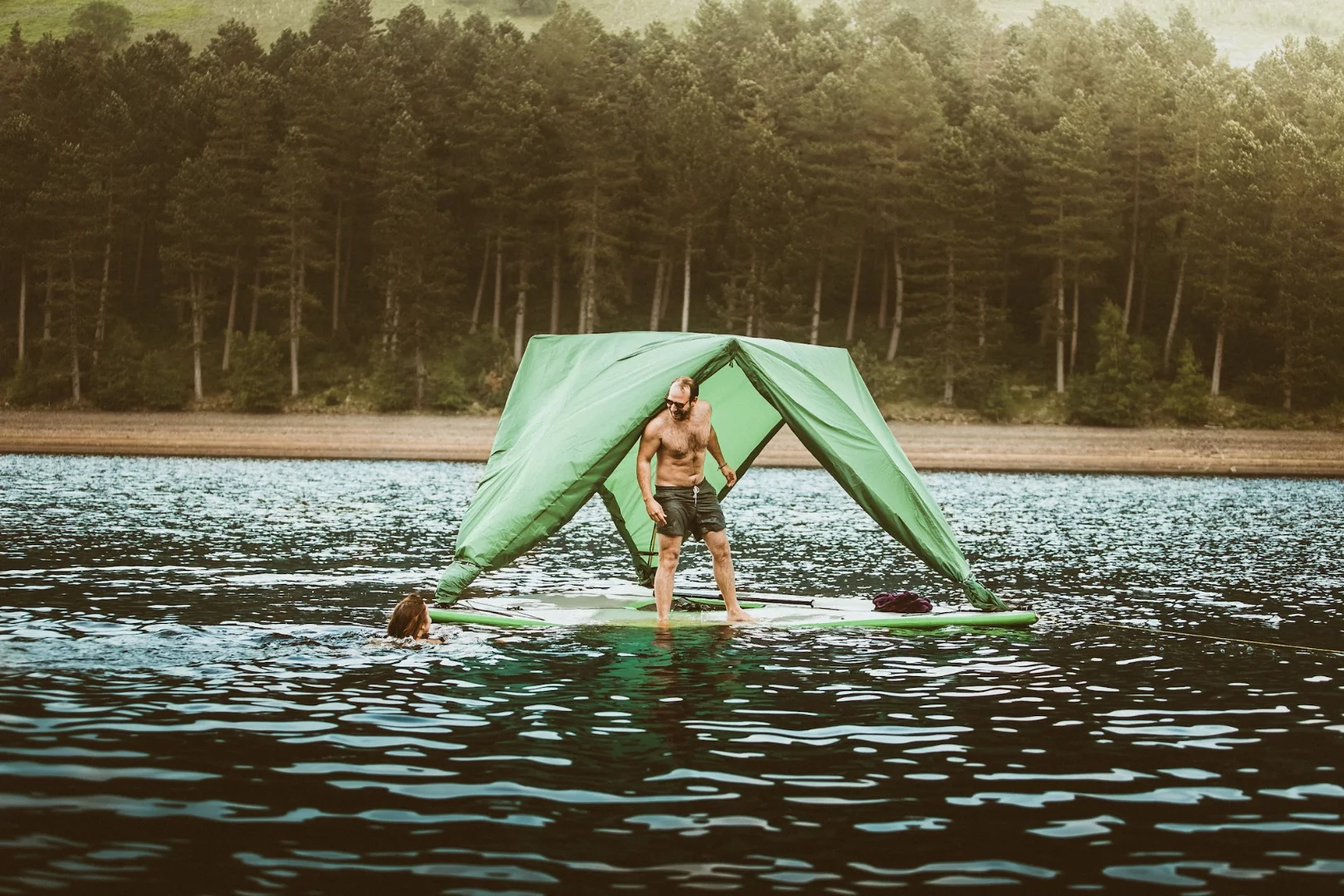 The Universe's inflatable floor can float roofless or with the rolled back rain fly serving as an awning