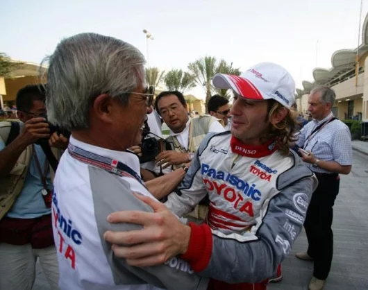 Jarno Trulli and Panasonic Toyota Team Principal Tsutomu Tomita,