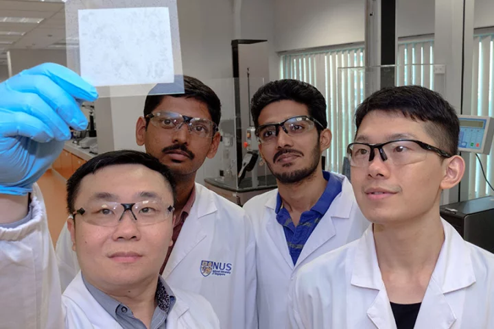 Assistant Professor Tan Swee Ching (left) and his team, with a sample of the hydrogel